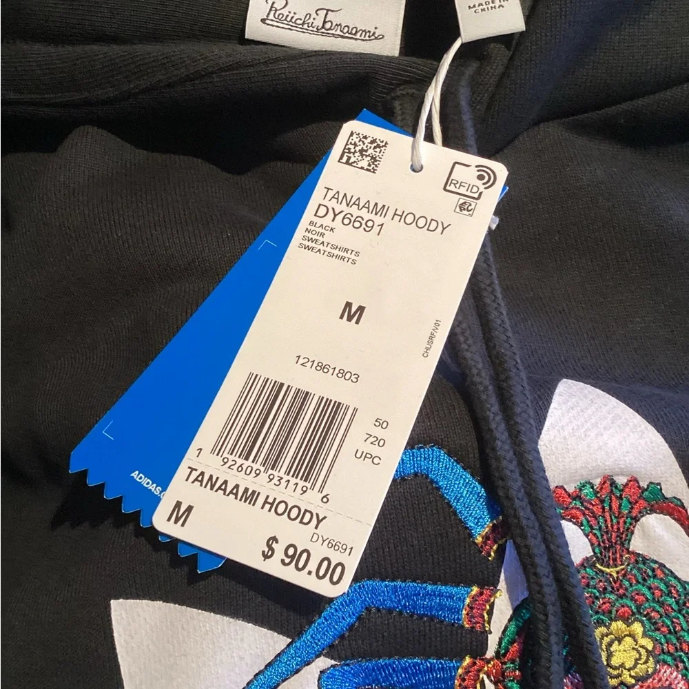 adidas sweatshirt featuring